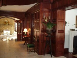 Fully paneled interior with custom molding produced for a luxury home renovation